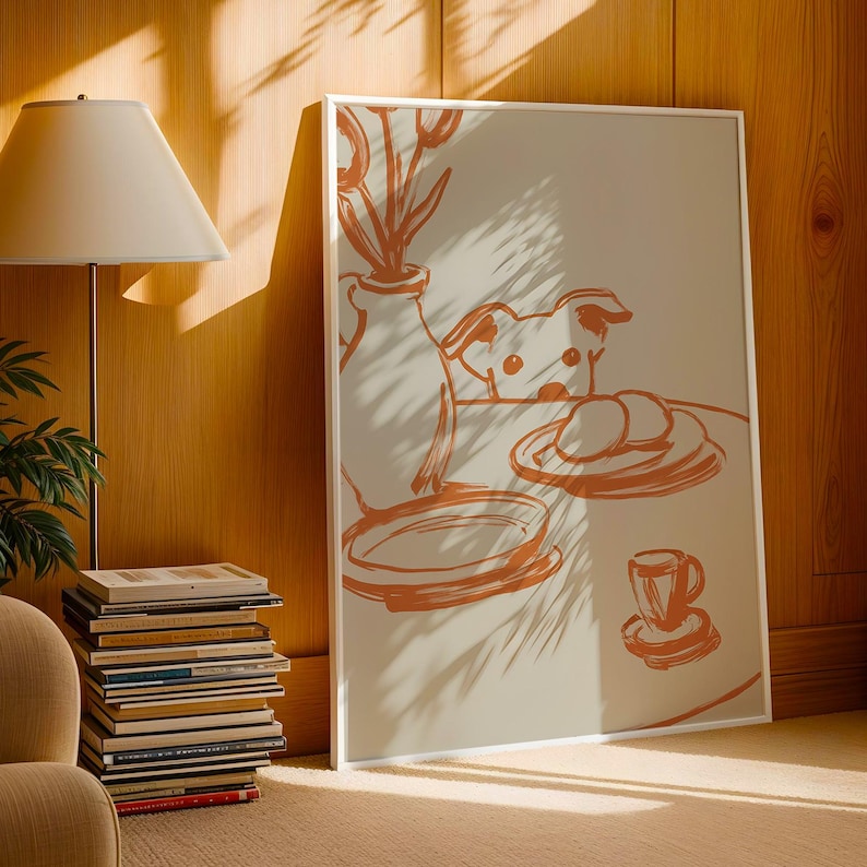 Minimalist terracotta line art poster featuring a curious dog peeking over a kitchen table. The still life scene includes a vase with flowers, plates, and a small coffee cup on a beige background. This modern hand-drawn illustration captures a cozy home or cafe vibe. Perfect as a gift for dog lovers, this aesthetic pet-themed wall decor fits boho and neutral interiors. High-quality physical print for kitchen, dining room, or living room wall art.