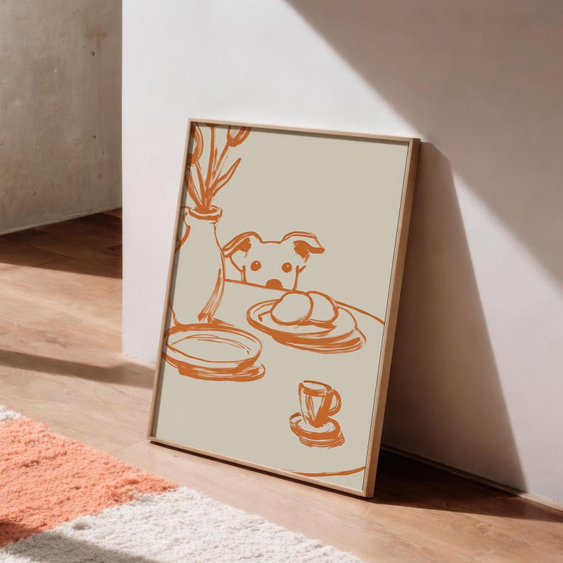 Minimalist terracotta line art poster featuring a curious dog peeking over a kitchen table. The still life scene includes a vase with flowers, plates, and a small coffee cup on a beige background. This modern hand-drawn illustration captures a cozy home or cafe vibe. Perfect as a gift for dog lovers, this aesthetic pet-themed wall decor fits boho and neutral interiors. High-quality physical print for kitchen, dining room, or living room wall art.