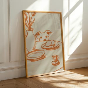 Minimalist terracotta line art poster featuring a curious dog peeking over a kitchen table. The still life scene includes a vase with flowers, plates, and a small coffee cup on a beige background. This modern hand-drawn illustration captures a cozy home or cafe vibe. Perfect as a gift for dog lovers, this aesthetic pet-themed wall decor fits boho and neutral interiors. High-quality physical print for kitchen, dining room, or living room wall art.