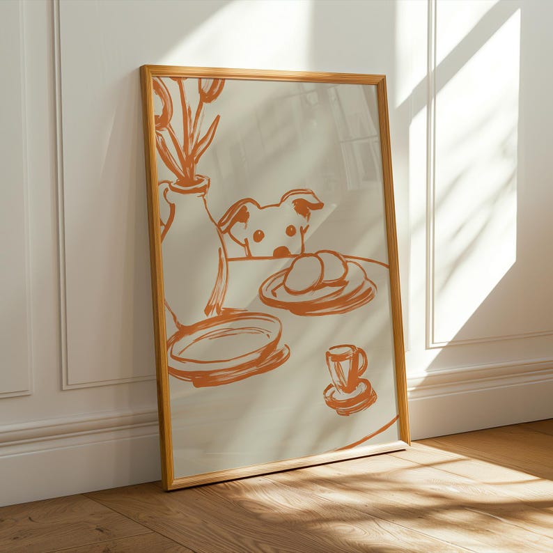 Minimalist terracotta line art poster featuring a curious dog peeking over a kitchen table. The still life scene includes a vase with flowers, plates, and a small coffee cup on a beige background. This modern hand-drawn illustration captures a cozy home or cafe vibe. Perfect as a gift for dog lovers, this aesthetic pet-themed wall decor fits boho and neutral interiors. High-quality physical print for kitchen, dining room, or living room wall art.