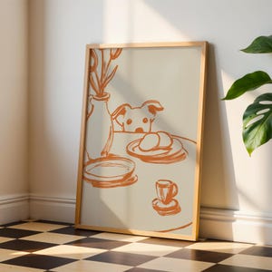 Minimalist terracotta line art poster featuring a curious dog peeking over a kitchen table. The still life scene includes a vase with flowers, plates, and a small coffee cup on a beige background. This modern hand-drawn illustration captures a cozy home or cafe vibe. Perfect as a gift for dog lovers, this aesthetic pet-themed wall decor fits boho and neutral interiors. High-quality physical print for kitchen, dining room, or living room wall art.