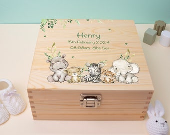 May include: Wooden keepsake box with a light wood finish. The lid features a green leafy design with a hippopotamus, zebra, lion, and elephant. The box is personalized with the name "Henry", the date "15th February 2024", and the time "08:08am 6lbs 5oz".