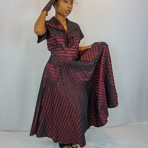 1930s/1940s three quarter length burgundy and black taffeta dress with wide pointed collar, full flair skirt from waist, side zipper, v-neck