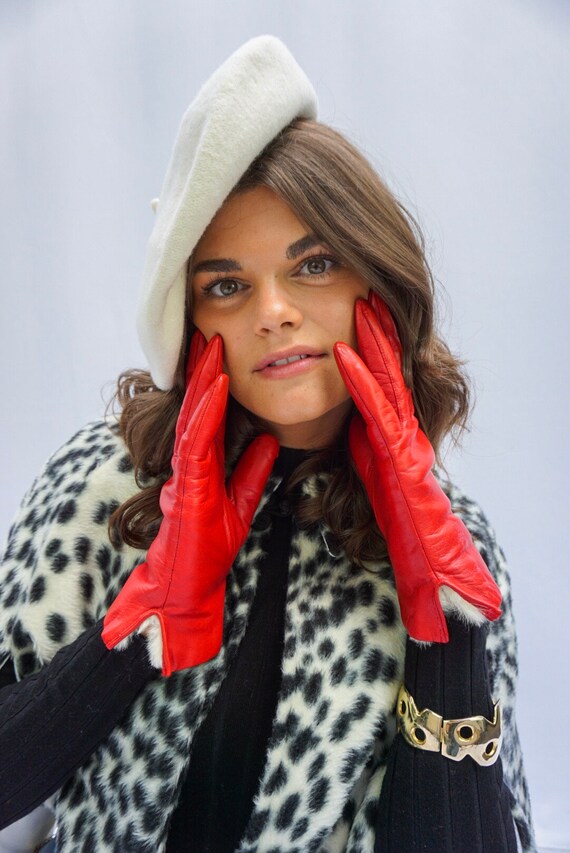 Red leather gloves with cheap fur