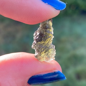 Genuine Moldavite beautiful drop shape from Chlum,. Czech Republic