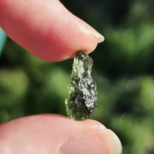 Genuine Moldavite beautiful drop shape from Chlum,. Czech Republic