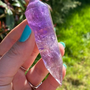 Beautiful Phantom Amethyst polished Vogel point from Bahia ,Brazil