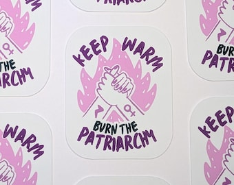May include: Five pink and purple stickers with the text "Keep Warm" and "Burn the Patriarchy". The stickers feature a stylized image of two hands holding each other, with flames behind them.