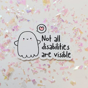May include: White ghost sticker with a heart above it and the text "Not all disabilities are visible".
