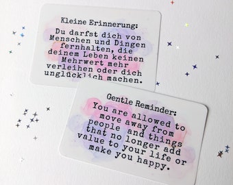 May include: Two colorful cards with inspirational quotes. The first card is pink and purple and says "Kleine Erinnerung: Du darfst dich von Menschen und Dingen fernhalten, die deinem Leben keinen Mehrwert mehr verleihen oder dich unglücklich machen." The second card is pink and blue and says "Gentle Reminder: You are allowed to move away from people and things that no longer add value to your life or make you happy."