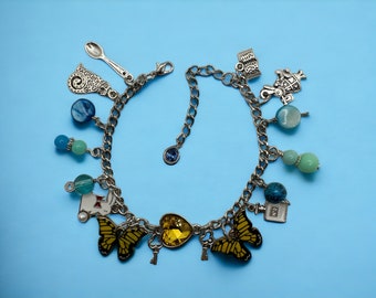 Women’s Alice in Wonderland Inspired Silver, Blue, and Yellow Butterfly Charm Bracelet