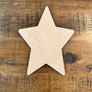 May include: A plain, unfinished wooden star shape. The star is light brown and has a smooth surface.