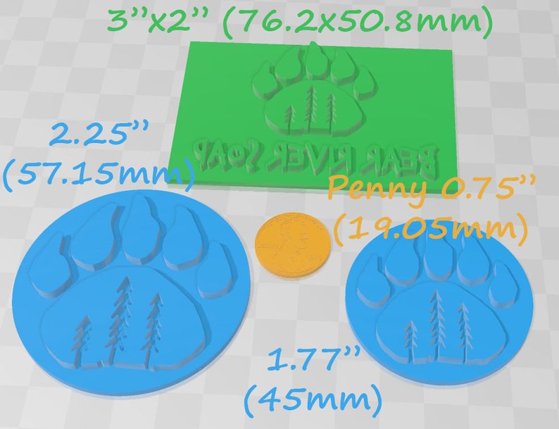 May include: Three blue silicone molds with a paw print design and three pine trees inside the print. The molds are 2.25 inches, 1.77 inches, and 0.75 inches in diameter. A green silicone mold with the same design is 3 inches by 2 inches. A penny is included for size comparison.