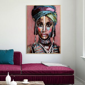 May include: A painting of a woman with colorful makeup and a blue and purple head wrap. She is wearing a beaded necklace and a striped shirt.