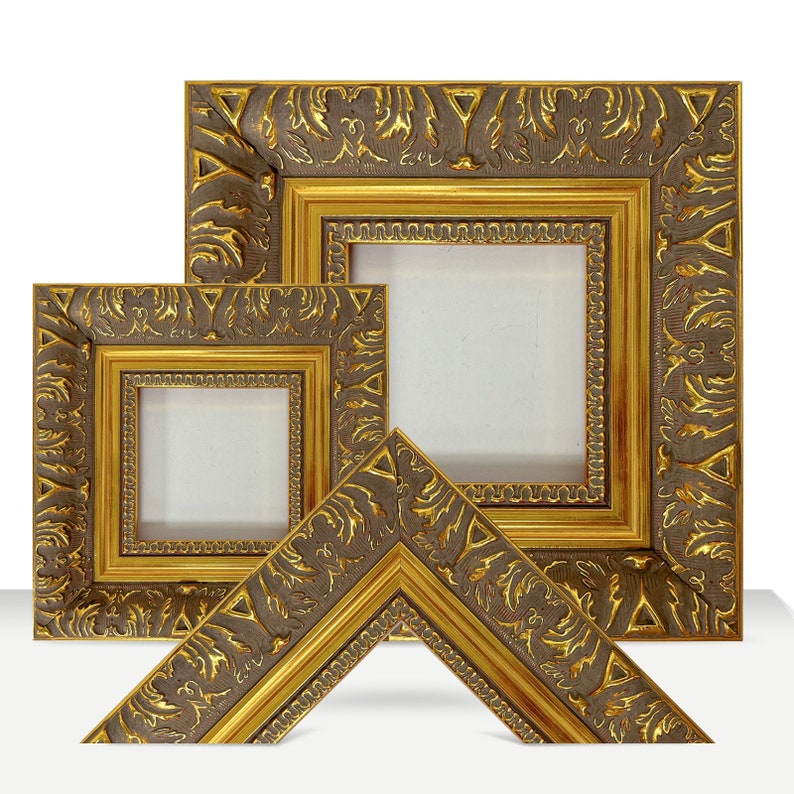 May include: Three ornate gold picture frames with intricate carvings and a dark brown finish. The frames are nested inside each other, with the largest frame in the back and the smallest frame in the front.