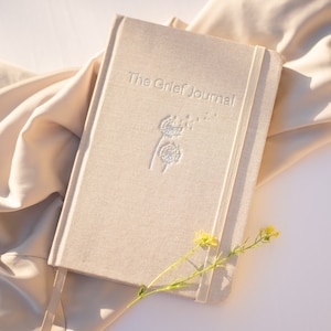 The Grief Journal: A prompted journal to help guide you through your grief image 1