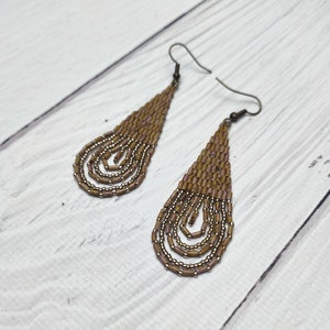 Elegant earrings handmade made of Japanese seed beads. Long earrings with pendants. Delicate and pastel earrings. Universal earrings.