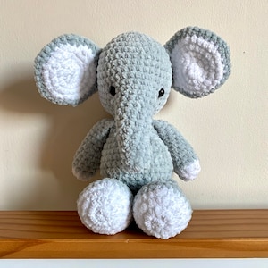 Crochet light grey elephant cuddly toy/ stuffed animal/ plushie. Handmade using soft velvet/ chenille yarn. Can be personalised.