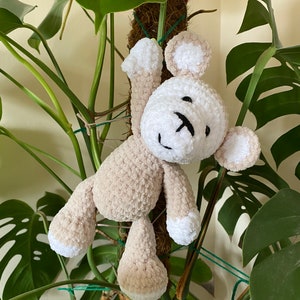 Custom crochet monkey cuddly toy/ stuffed animal/ plushie. Handmade with soft chenille yarn in customisable colours.