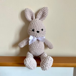 Crochet beige bunny cuddly toy/ stuffed animal/ plushie. Handmade using soft velvet/ chenille yarn. Can be personalised.