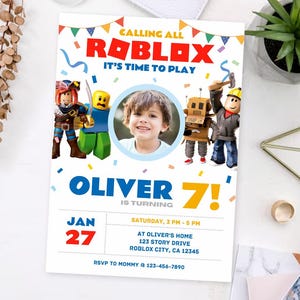May include: A colorful invitation for a Roblox themed birthday party. The invitation features a photo of a young boy, the text "Calling all Roblox, It's time to play", and the birthday boy's name "Oliver" with the age "7!" in large, colorful text. The invitation also includes the date "Jan 27" and the time "Saturday, 3 PM - 5 PM".