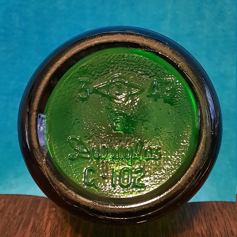 Vintage 19401950 Early Douglas Glass green glass soda bottle Etsy