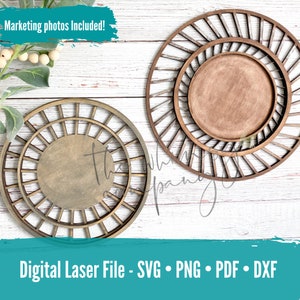 May include: Three wooden laser cut circles with a sunburst design. The circles are different sizes and are arranged in a staggered pattern. The circles are on a white wooden background.
