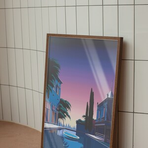 May include: A framed illustration of a canal scene with two buildings, palm trees, and a small boat in the water. The sky is a gradient of purple, pink, and blue with white rays of light.