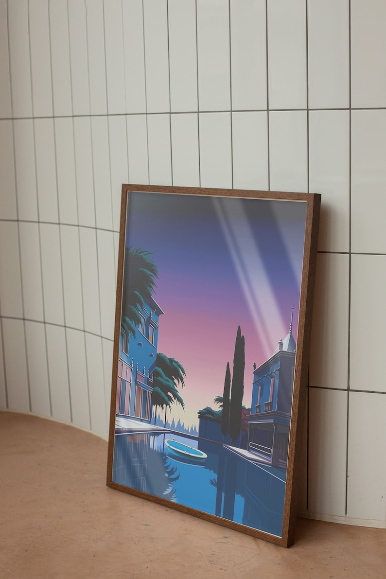May include: A framed illustration of a canal scene with two buildings, palm trees, and a small boat in the water. The sky is a gradient of purple, pink, and blue with white rays of light.
