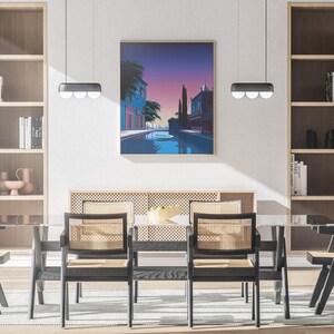 May include: A dining room with a glass table and six black chairs with woven cane seats. The table is set with a bowl of fruit. There are two wooden bookshelves on either side of the room, and a large framed print of a cityscape with a canal hanging on the wall.