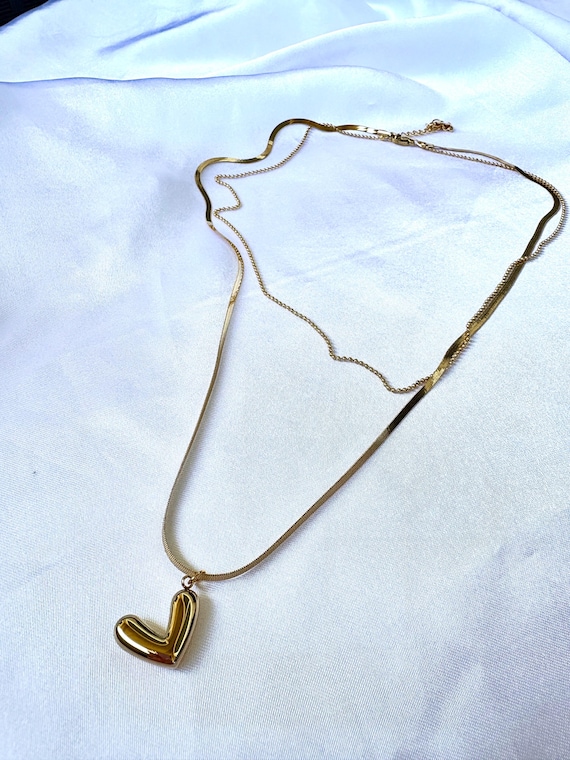 Set in acciaio inossidabile dorato con cuore e perle d'acqua dolce | Paris Fashion Shops