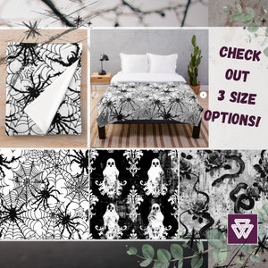 May include: Black and white Halloween themed throw blanket with a spider web pattern. The blanket is shown on a bed with white pillowcases. The text "CHECK OUT 3 SIZE OPTIONS!" is in the upper right corner of the image.