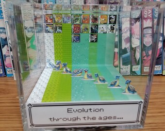 Pokemon Generation Lapras Diorama Cube – Evolution Through the Ages, Handmade Crystal Display, Retro Pokemon Collectible