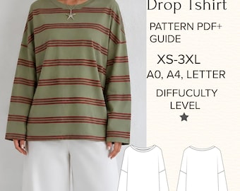 Puede incluir: Una camiseta de manga larga color verde oliva con rayas horizontales de color rojo oscuro. El texto dice: Slouchy Drop Tshirt, PATTERN PDF+ GUIDE, XS-3XL, A0, A4, LETTER, DIFFICULTY LEVEL. Incluye un dibujo lineal en blanco y negro.