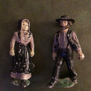 Antique Cast Iron Amish Man and Woman Figurines