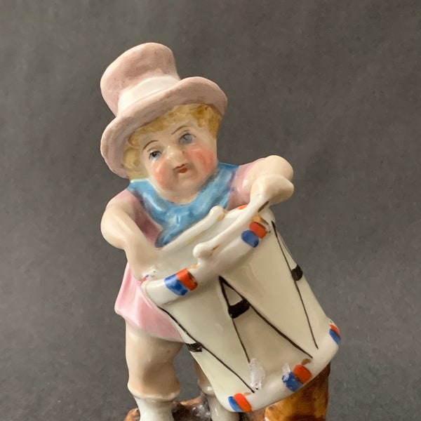 Antique Victorian era German Conta and Boehme Fairing Porcelain Figure Child with Drum Marked 4250 match striker/ holder