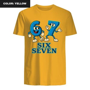 May include: Yellow t-shirt featuring a cartoon design of the numbers six and seven as animated characters. The numbers are blue with white accents and are positioned above the text "SIX SEVEN" in blue.