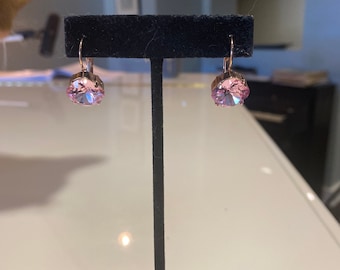 Cushion cut rose/pink 12mm Swarovski Crystal earring set in rose gold plated prong setting with lever back hooks.