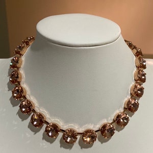 Beautiful Anna Wintour tennis style statement necklace with 12mm round Swarovski crystals in shade Vintage Rose set in rose gold.
