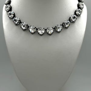 Swarovski Crystal tennis necklace in the Anna Wintour style clear 12mm rivoli matte black  setting.