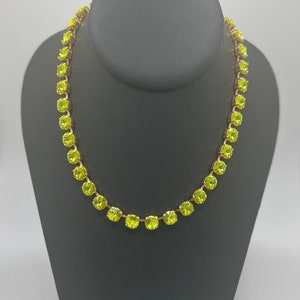 Stunningly beautiful Swarovski crystal Anna Wintour style tennis necklace with citrus green 8mm crystals on gold plated setting.