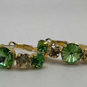 Swarovski crystal large gold hoop earrings in peridot green and jonquil 12mm and 8mm round.