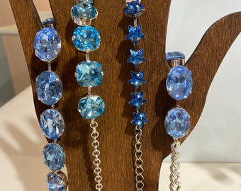 Bracciale tennis con cristalli Swarovski, acquamarina blu brillante, tonalità topazio chiaro, con 5 pietre da 12 mm tagliate a cuscino su montatura in argento.