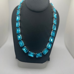 Beautiful Anna Wintour style statement necklace with 18x13  rectangle  aqua topaz light blue crystals in silver plated setting.