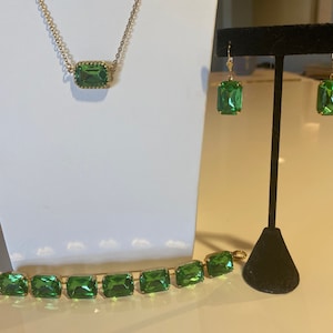 Peridot green octagon 18x13 Swarovski Crystal statement earrings in gold filled prong setting with leverback hooks.