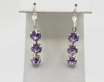Long dangle drop earrings with 8mm three stone violet lilac lavender Swarovski crystals in silver plated  setting.
