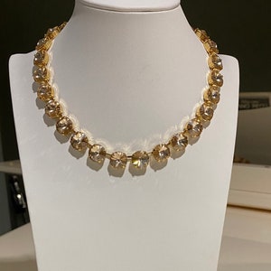 Anna Wintour style statement tennis necklace with light silk champagne shade Swarovski Crystals 12mm rivoli (round) in gold plated setting.