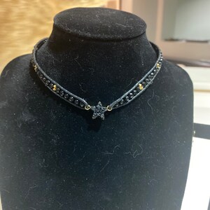 Black leather beaded choker with star shaped druzy focal bead, onyx and Swarovski Crystals.