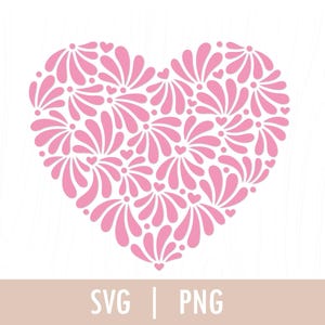 May include: A pink heart-shaped design made up of small pink flower-like shapes. The design is perfect for Valentine's Day or any occasion where you want to express love.