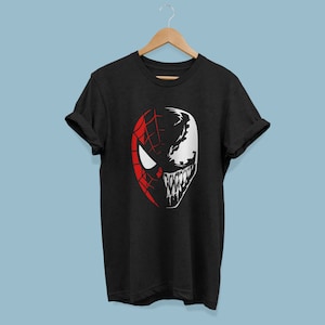 May include: Black t-shirt with a graphic of a split face, half Spider-Man and half Venom.
